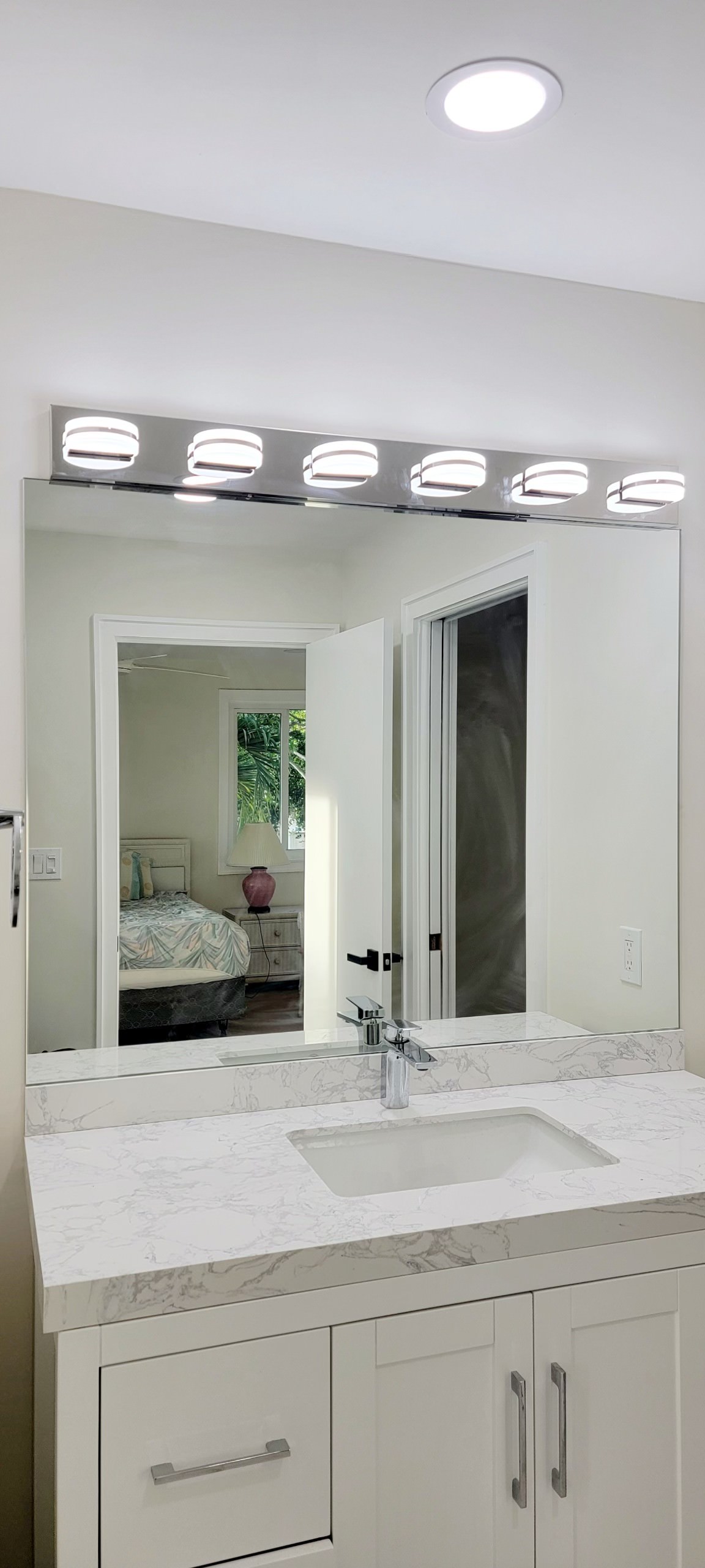 Custom frameless mirror installation